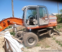 Продаем колесный экскаватор Fiat Kobelco E-175W Evolution, 0,93 м3, 2005 г.в. - <ro>Изображение</ro><ru>Изображение</ru> #2, <ru>Объявление</ru> #1562735